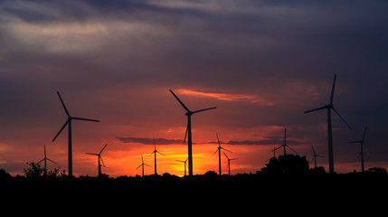 Landscape of evening with wind turbines