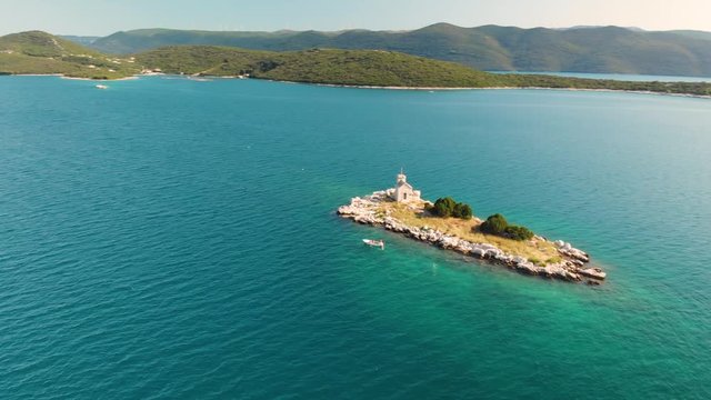 Aerial parallax over the beautiful island of Rudagh near Klek in Croatia
