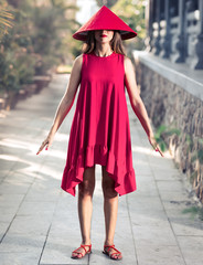 Fashion portrait of a beautiful woman in red hat