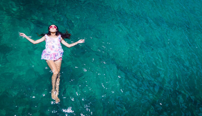 Aerial view of a woman in the sea