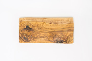 Wooden cutting board from olive tree on white background. Cooking, recipe concept. Top view, flat lay, mock up, copy space