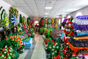 Shop selling coffins, funeral wreaths and flowers. Sale of funeral accessories