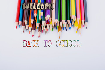 Color pencils and back to school title
