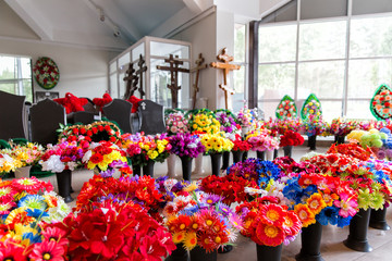 Sale of funeral accessories. Shop selling coffins, funeral wreaths and flowers