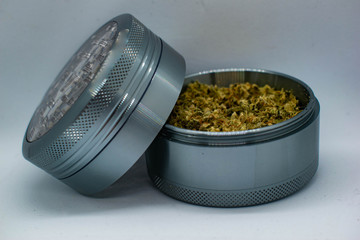 Ground Cannabis in Grinder