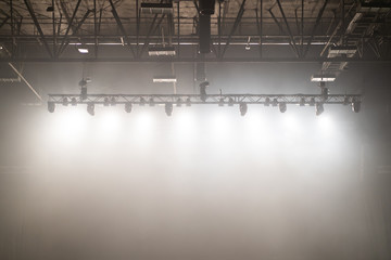 LED light and spotlight hanging for a concert with smoke effect