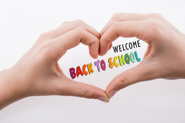 Hand making a heart shape