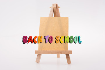 Brown color  notepaper on a painting tripod