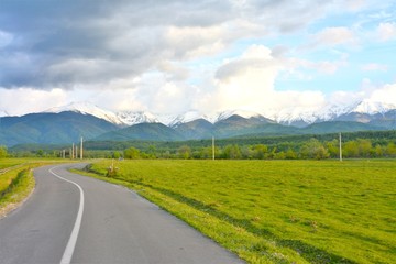 Fototapeta na wymiar road leading to the Fagaras mountains