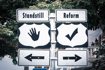Street Sign to Reform versus Standstill