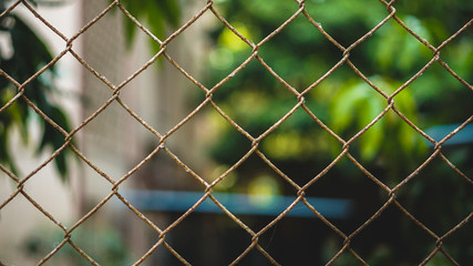 chain link fence with barbed wire