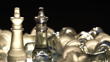 The concept of business competition: Close-up of glass chess footage slow motion
