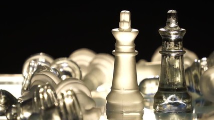 The concept of business competition: Close-up of glass chess footage slow motion