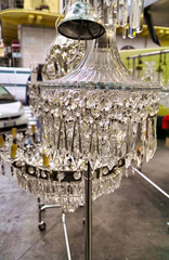 detail of glass chandelier in a market