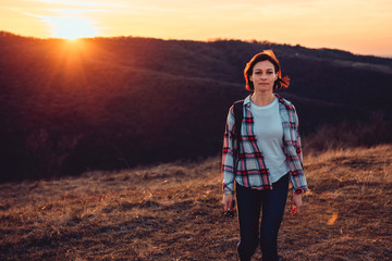 Portrait of mature woman hiking on mountain