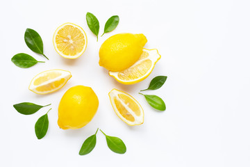 Fresh lemon with leaves isolated on white