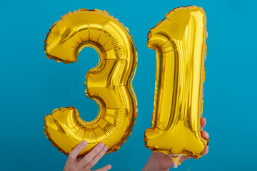 Gold foil number 31 thirty one celebration balloon