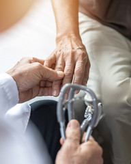 Parkinson's disease patient, Arthritis hand pain or mental health care concept with geriatric...