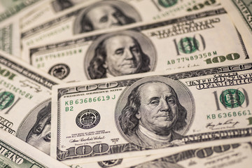 Background of one hundred dollar bills