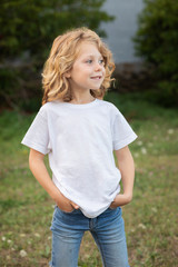 Fototapeta premium Funny blond kid with long hair