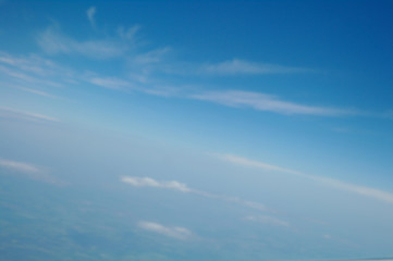 Fototapeta na wymiar clouds and blue sky seen from plane