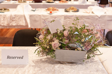 bouquet of flowers in vase on party table