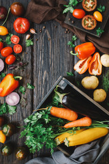 Autumn harvest of organic vegetables. Rustic table background, top view, frame.
