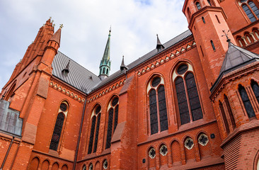 Historic Catholic temple. Church of St. Catherine in Torun, Poland. August 2019