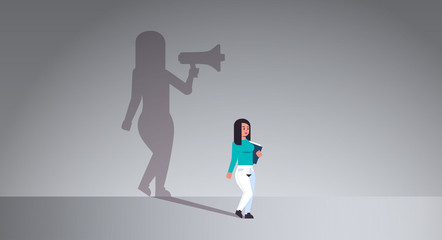 girl dreaming about being manager or boss screaming in megaphone shadow of business woman with loudspeaker imagination aspiration concept full length flat horizontal