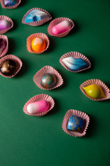 Background with sweet chocolate bonbons set