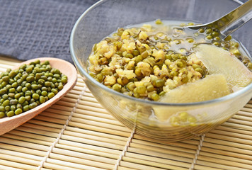 Healthy with Thai dessert Green beans in syrup with ginger.