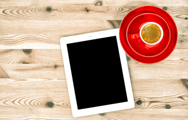 Digital tablet black screen red cup coffee Flat lay