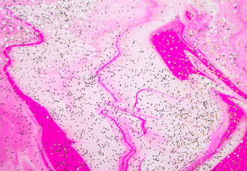 Abstract colorful painting background made in fluid art technique. Fluid art pattern in trendy...