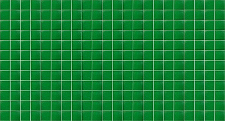 Green glossy square ceramic tile texture background. Green tiles wall.