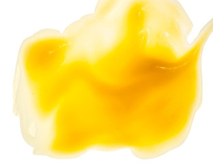 Yellow colorful cream is close