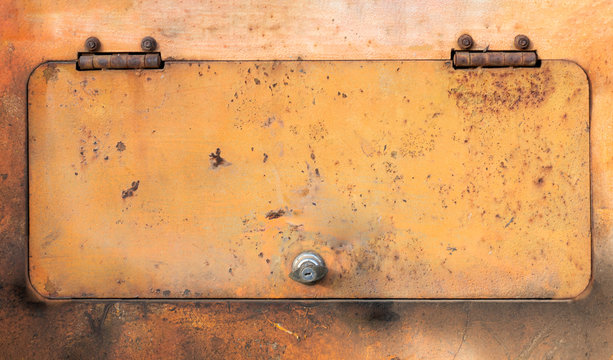 Rust and dirt yellow cabinet cover