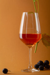 One glass with rose wine