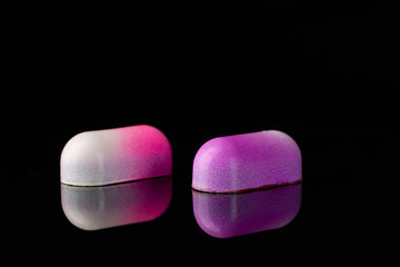 Two luxury chocolate bonbon close-up