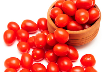 Red cherry tomatoes on a white background