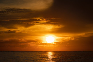 Beautiful sunrise on the sea. Low key of image.