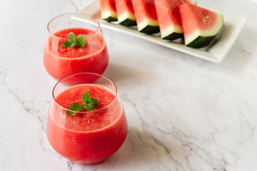 Watermelon drink in glasses with mint. Summer drink concept.