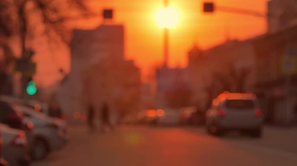 Skyline, urban road and buildings at sunset. Evening urban landscape.