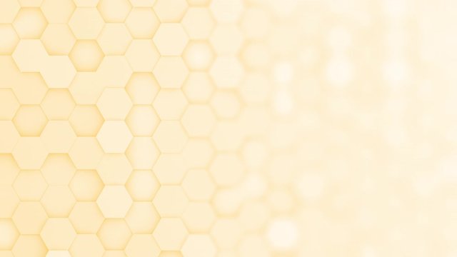 Yellow hexagons moving up and down in a random pattern. 3D animated motion background loop. Top down isometric view with gradual blur effect for copyspace.