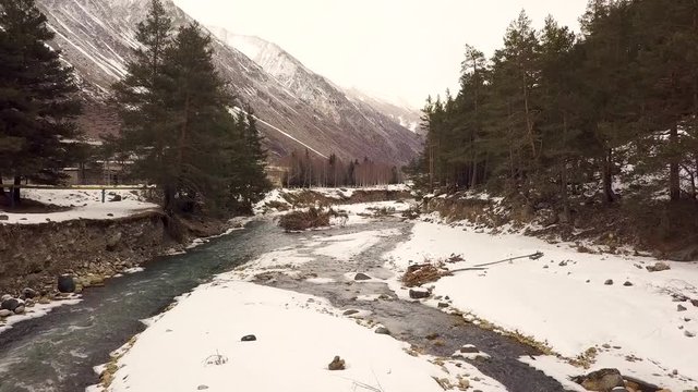 Mountain river in the village of Elbrus aerial video shooting