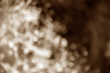 Sepia color blurred bokeh. Defocused background