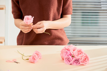 People making paper craft flower art