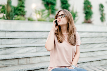 woman talking on the phone outdoor