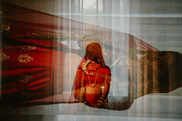Beautiful Hindu bride is happy on the day of her wedding