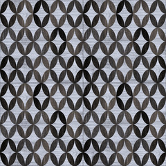 Black and white ceramic tile with realistic wood pattern.