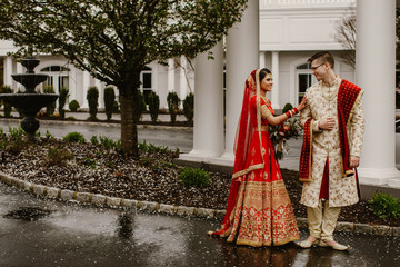 Happy Hindu groom and Hindu brides are on their wedding day